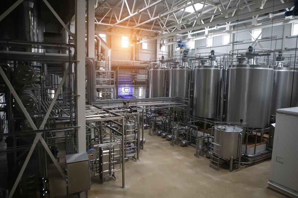 How is stainless steel used in the food processing industry?